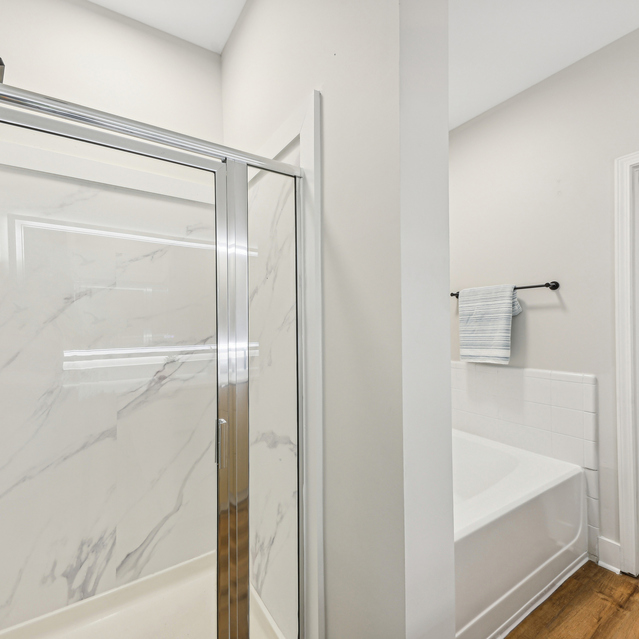 Drift Dunwoody - Renovated Apartments in Dunwoody, GA - Bathroom and Walk-in Closet